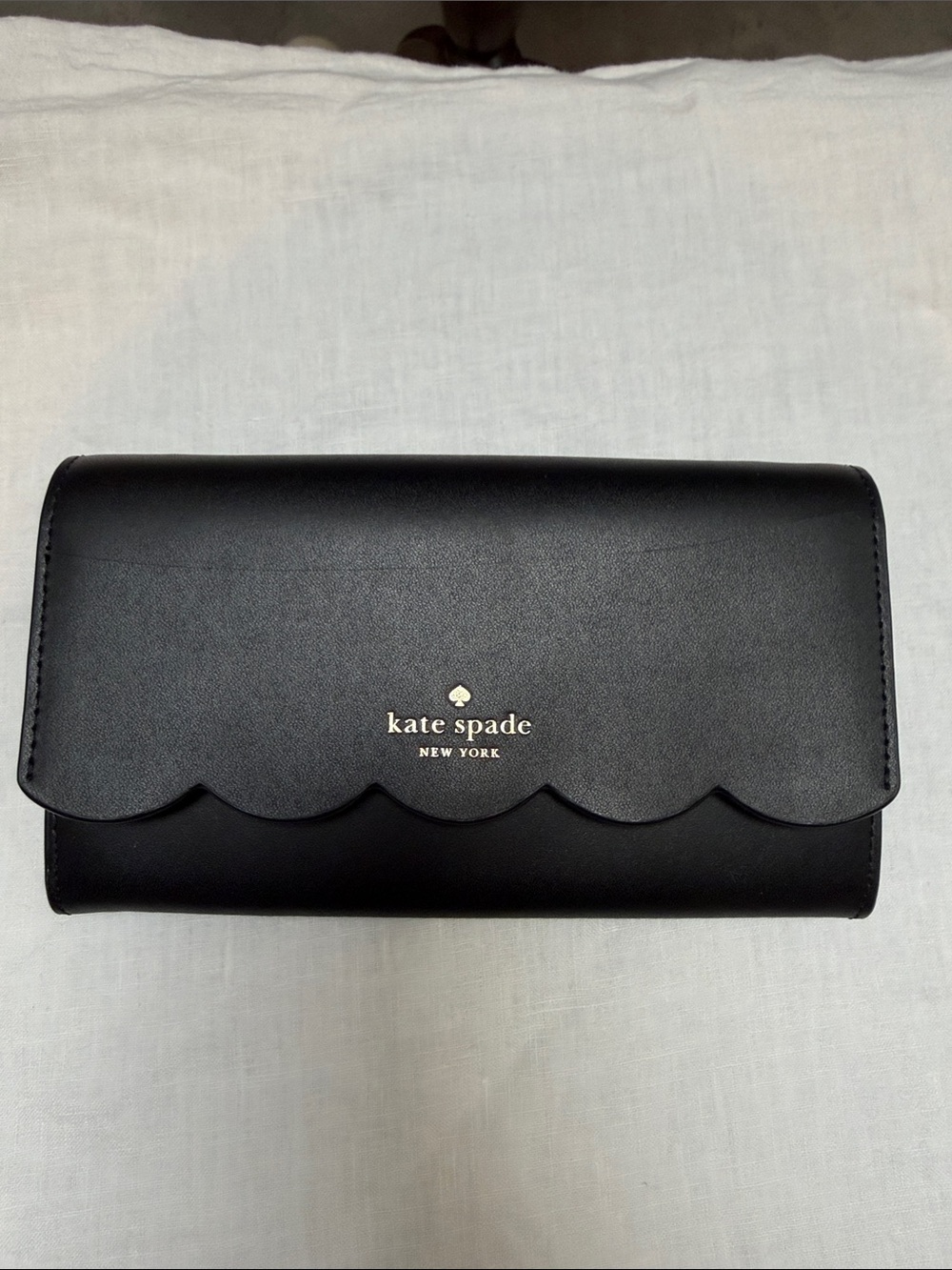 kate spade black scallop flap leather wallet with gold logo